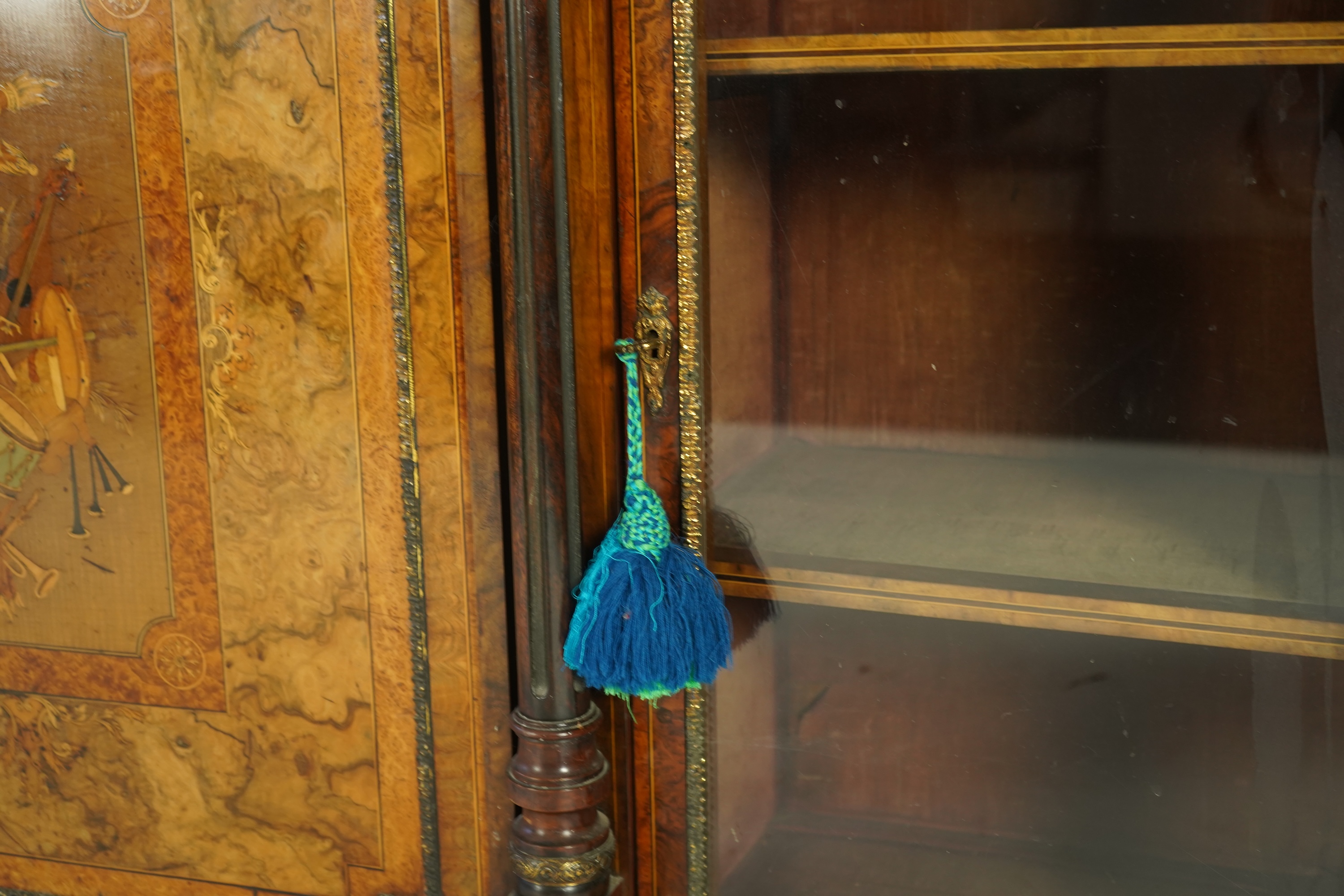 A Victorian birds eye maple banded, gilt metal mounted figured walnut side cabinet
